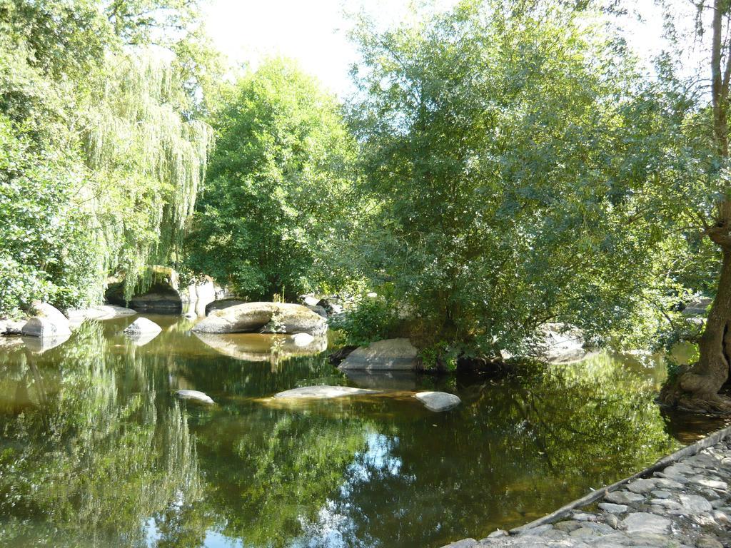 Village De Gites Du Moulin Neuf Getigne Exterior foto
